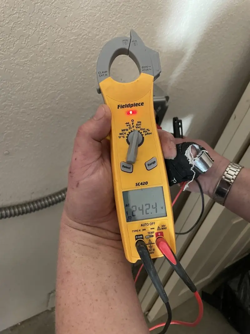 Voltage testing with clamp meter during Outlet Installation in Sylvania